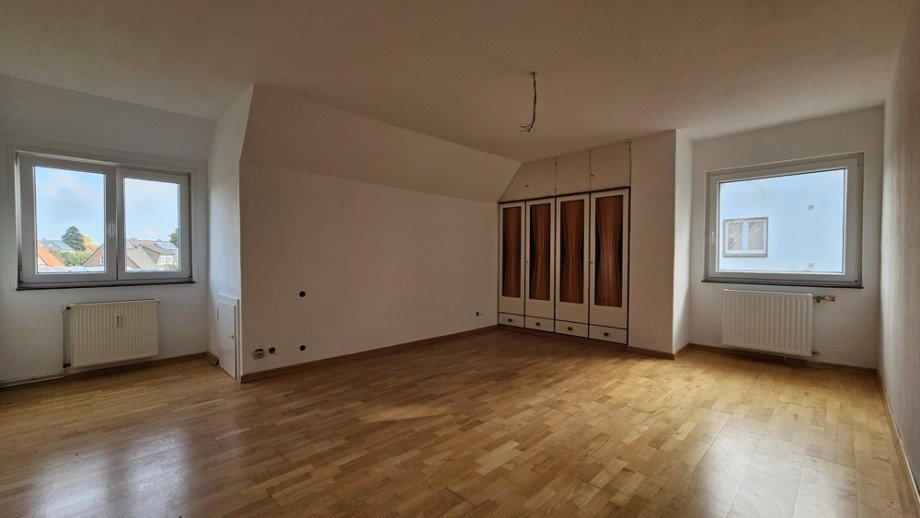 Zimmer 1 (1) Dachgeschosswohnung Siedenburg